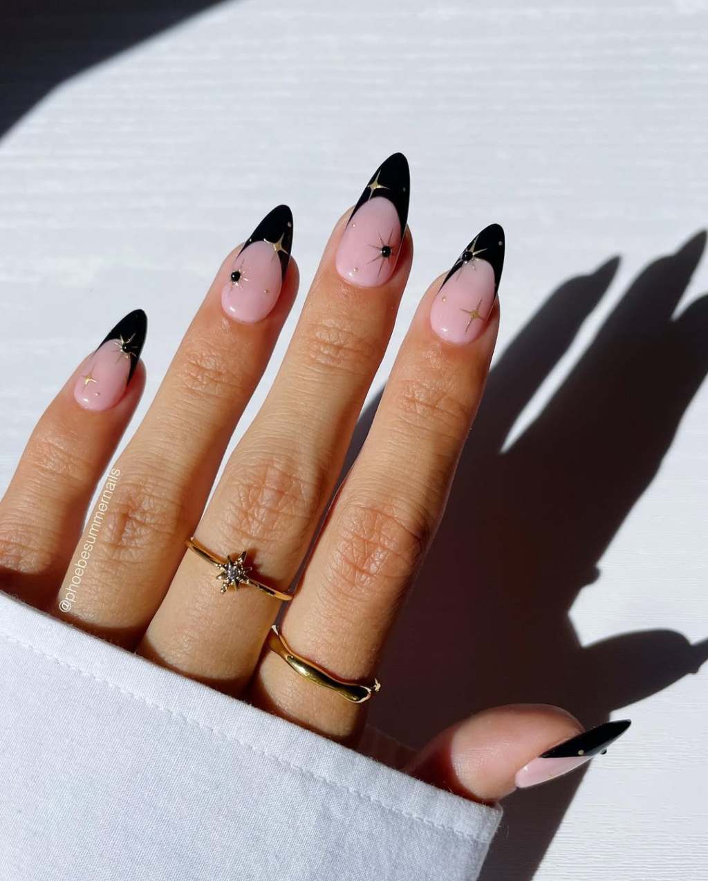 Sheer Pink Stiletto with Black French Tips and Gold Stars Sheer Pink Stiletto with Black French Tips and Gold Stars — Black Nail Ideas