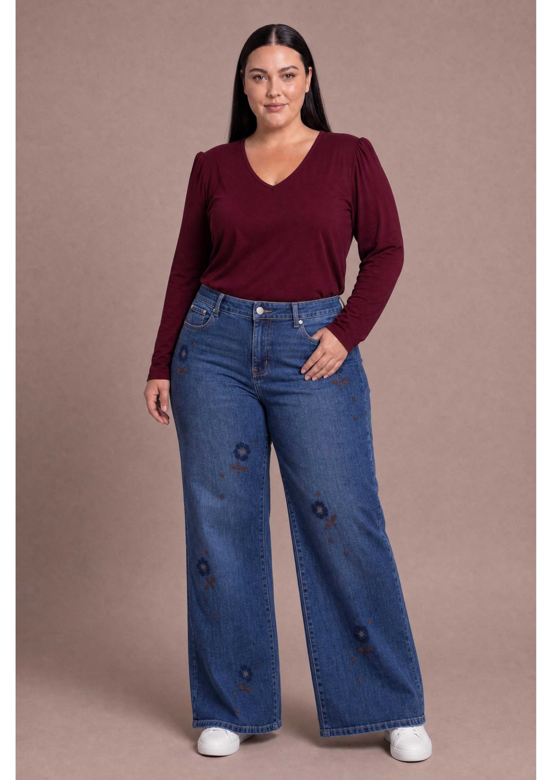 Embroidered Wide-Leg Jeans with Puffed Shoulder Top Embroidered Wide-Leg Jeans with Puffed Shoulder Top — Winter Outfits for Curvy Women