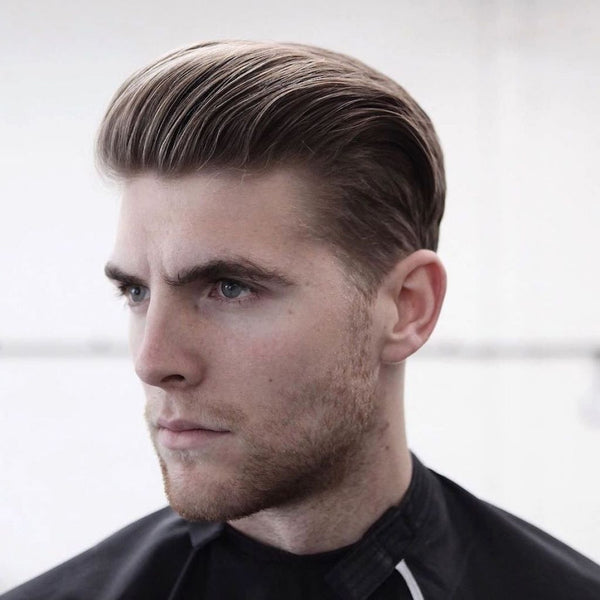 Dark Blonde Slicked Back With Volume Dark Blonde Slicked Back With Volume — Winter Haircuts for Men
