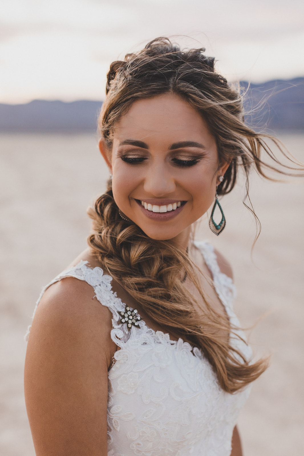 Light Brown Side Braid With Loose Tendrils Light Brown Side Braid With Loose Tendrils — Winter Wedding Hairstyles