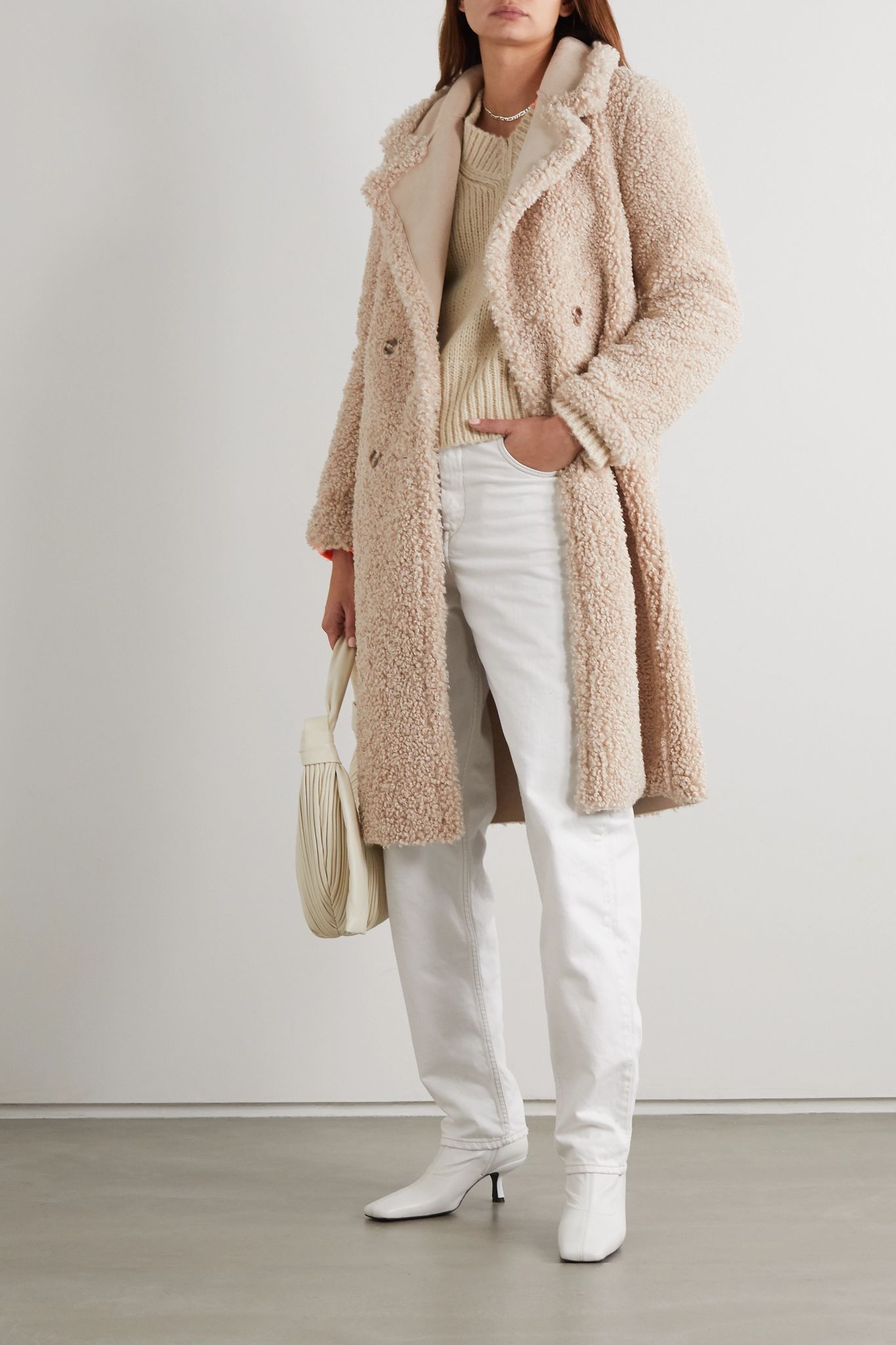 Cream Shearling Coat with White Jeans and Fringe Bag — Shearling Coat Outfits