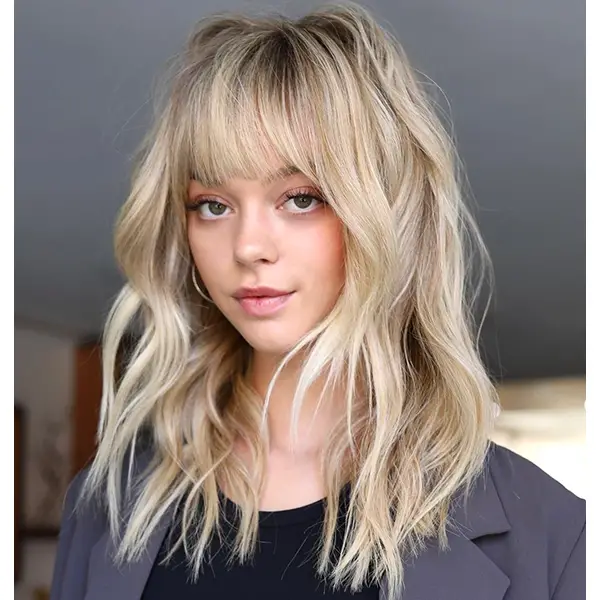 Shoulder Length Waves With Blunt Bangs Shoulder Length Waves With Blunt Bangs — Winter Haircuts for Wavy Hair