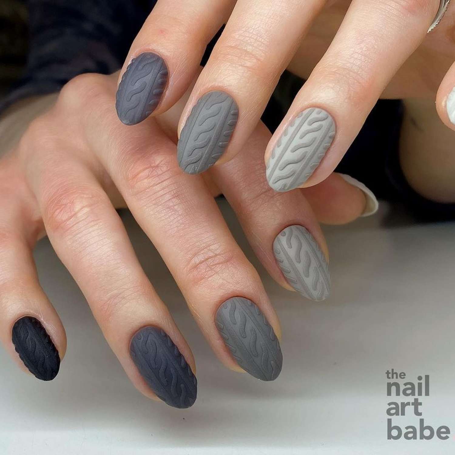 Various Shades Of Grey Black Textured Cable Knit Stiletto Nails Various Shades Of Grey Black Textured Cable Knit Stiletto Nails — Winter Gray Nails