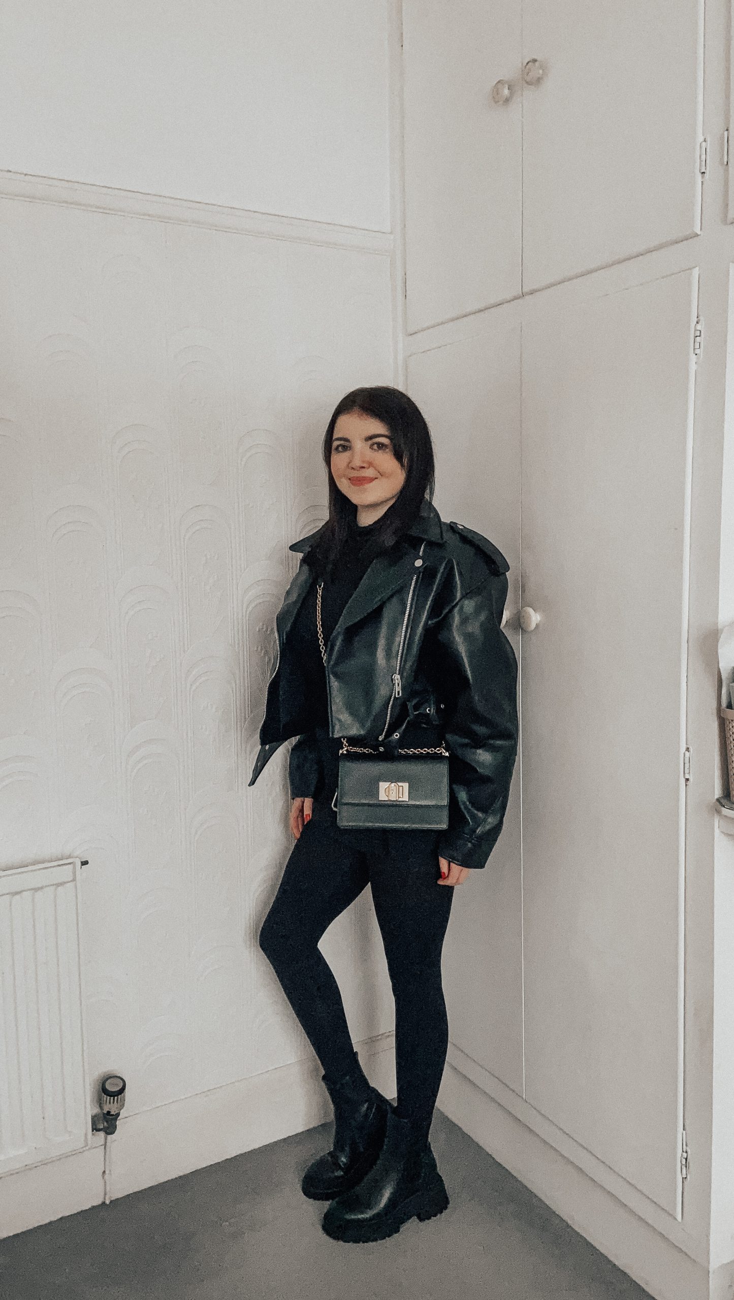 Cropped Leather Biker Jacket with Turtleneck and Chunky Boots — All Black Winter Outfits