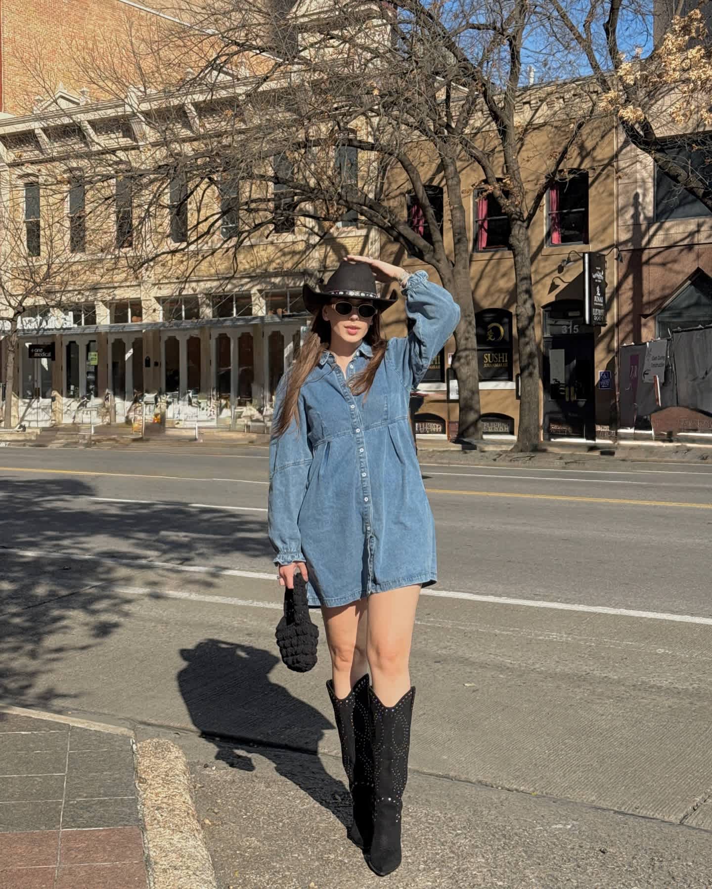 Denim Shirt Dress with Black Cowboy Hat and Boots Denim Shirt Dress with Black Cowboy Hat and Boots — Nashville Winter Outfits