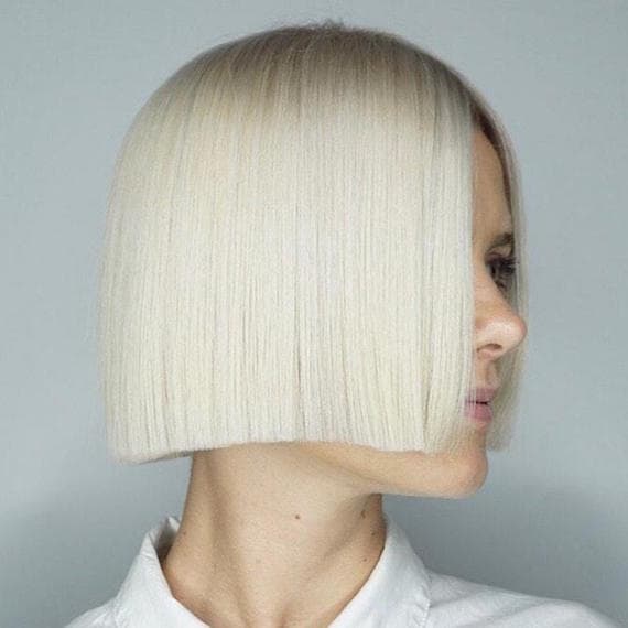 Sharp Chin-Length Platinum Bob With Blunt Bangs Sharp Chin-Length Platinum Bob With Blunt Bangs — Icy Blonde Hair