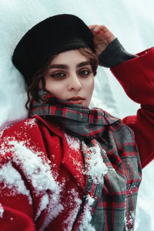 Bold Red Coat and Plaid Scarf for a Snowy Scene — Winter Photoshoot Outfits
