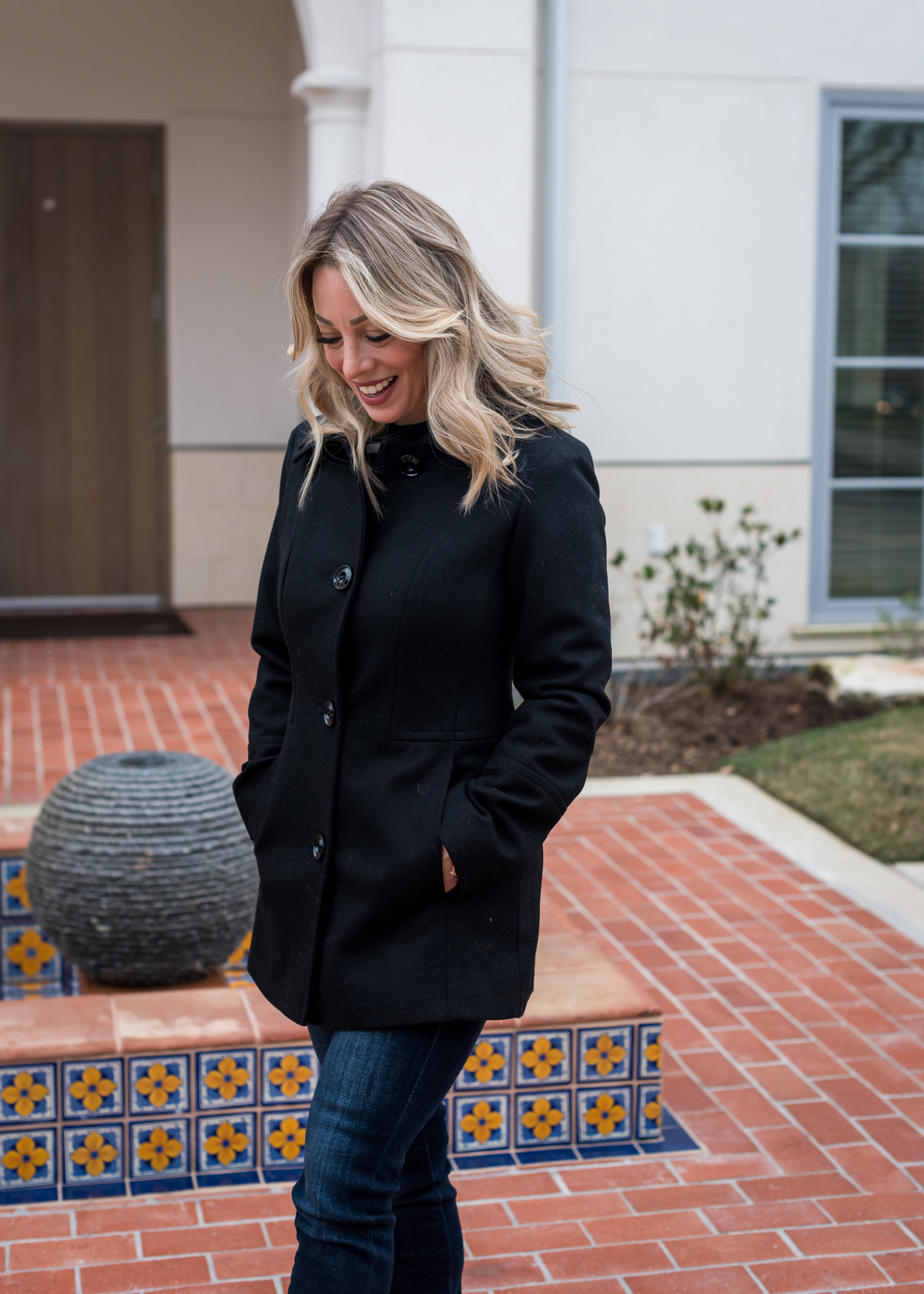 Black Peacoat with Striped Top, Jeans, and Yellow Scarf — Peacoat Outfits