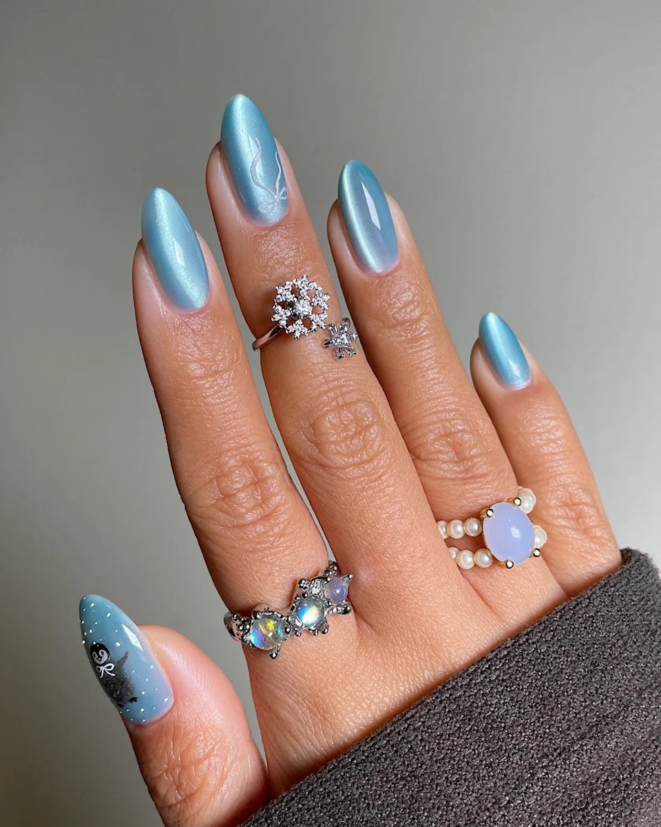 Shimmering Icy Blue Cat-Eye with Swirls Shimmering Icy Blue Cat-Eye with Swirls — Icy Blue Nails