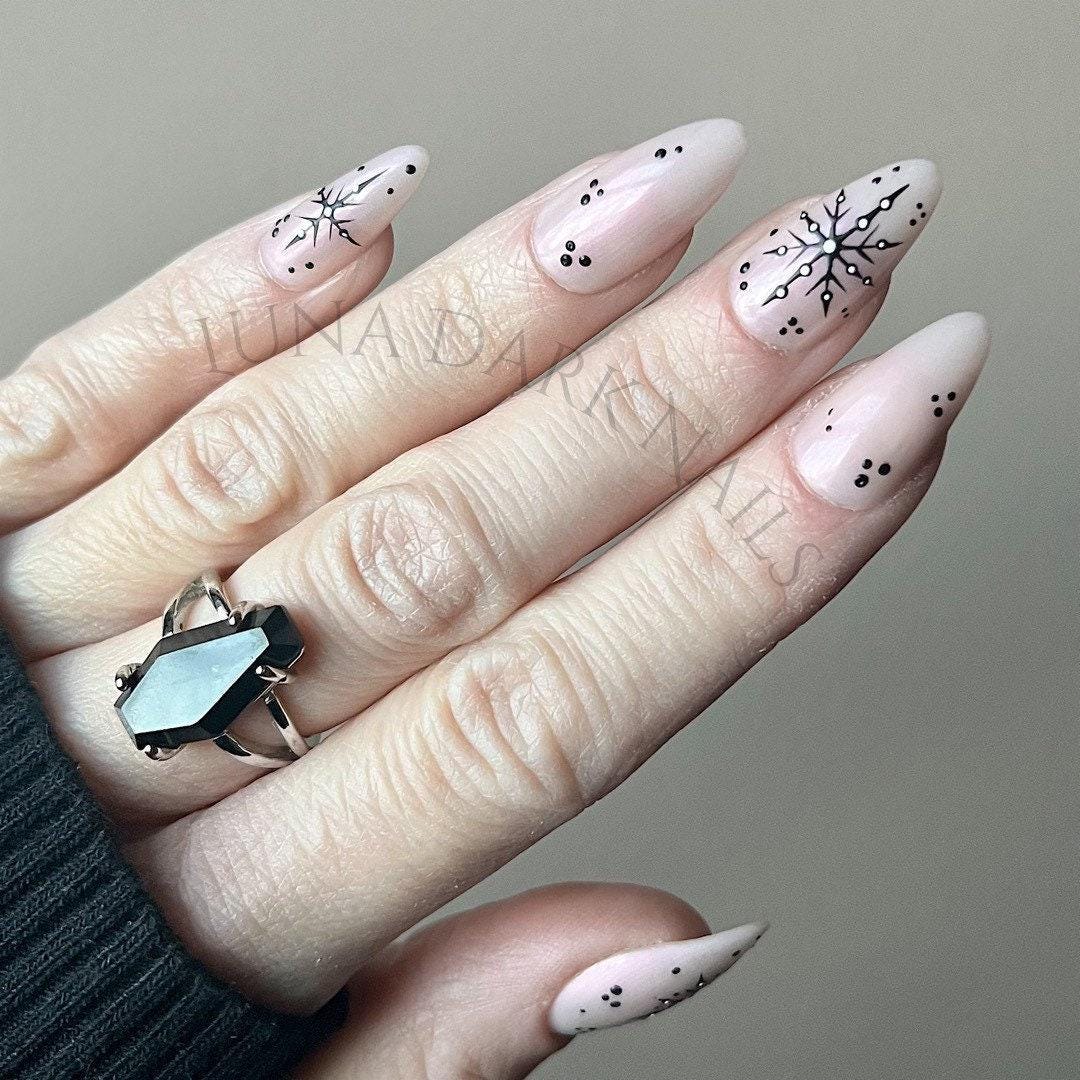 Sheer Pale Pink Black Snowflake Stilettos Sheer Pale Pink Black Snowflake Stilettos — Snowflake Nails