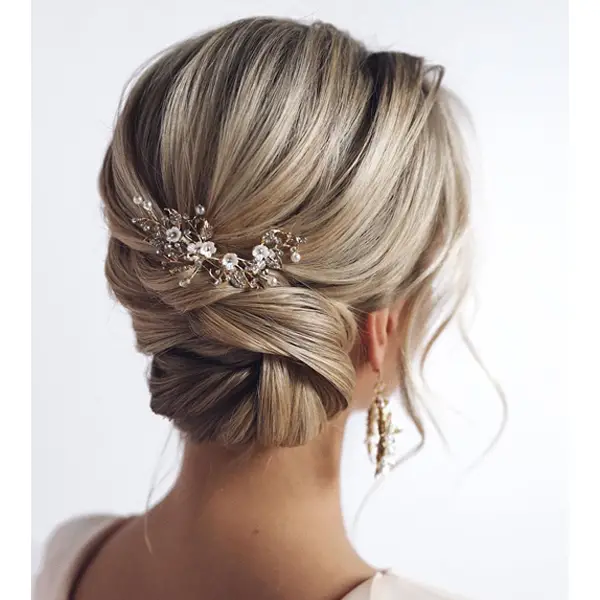 Polished Low Chignon With Accessory — Winter Updos