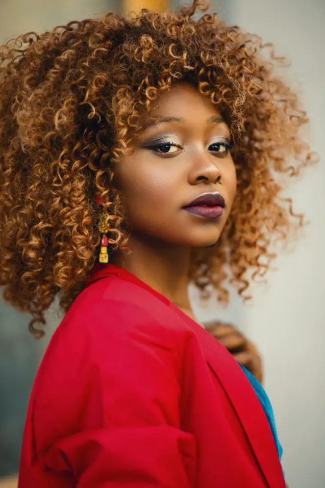 Medium Brown Curls with Caramel Highlights — Winter Hair Colors for Black Women