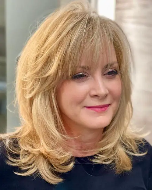 Honey Blonde Layered Shag — Winter Hairstyles for Women Over 70