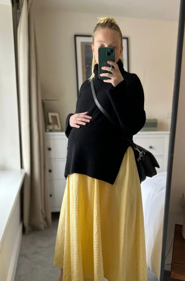 Black Turtleneck Sweater with Flowing Yellow Midi Skirt Black Turtleneck Sweater with Flowing Yellow Midi Skirt — Winter Maternity Outfits