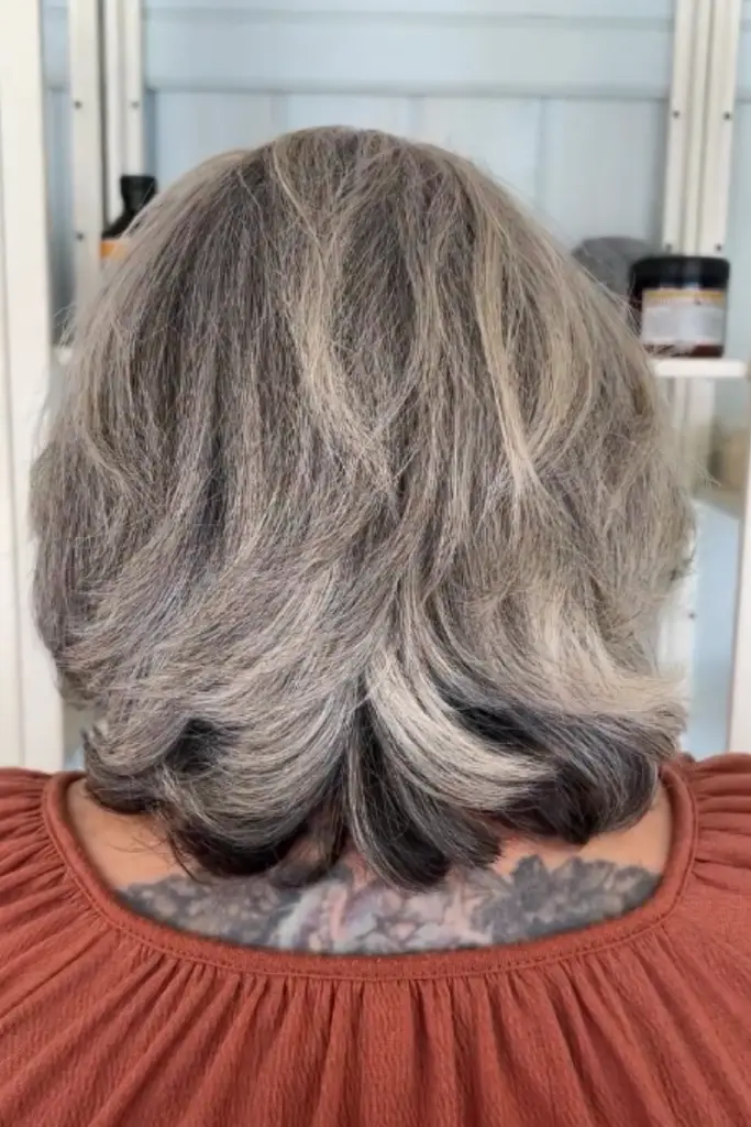 Layered Slightly Flipped Ends Layered Bob With Natural Gray and Lighter Highlights Layered Slightly Flipped Ends Layered Bob With Natural Gray and Lighter Highlights — Gray Blending Highlights