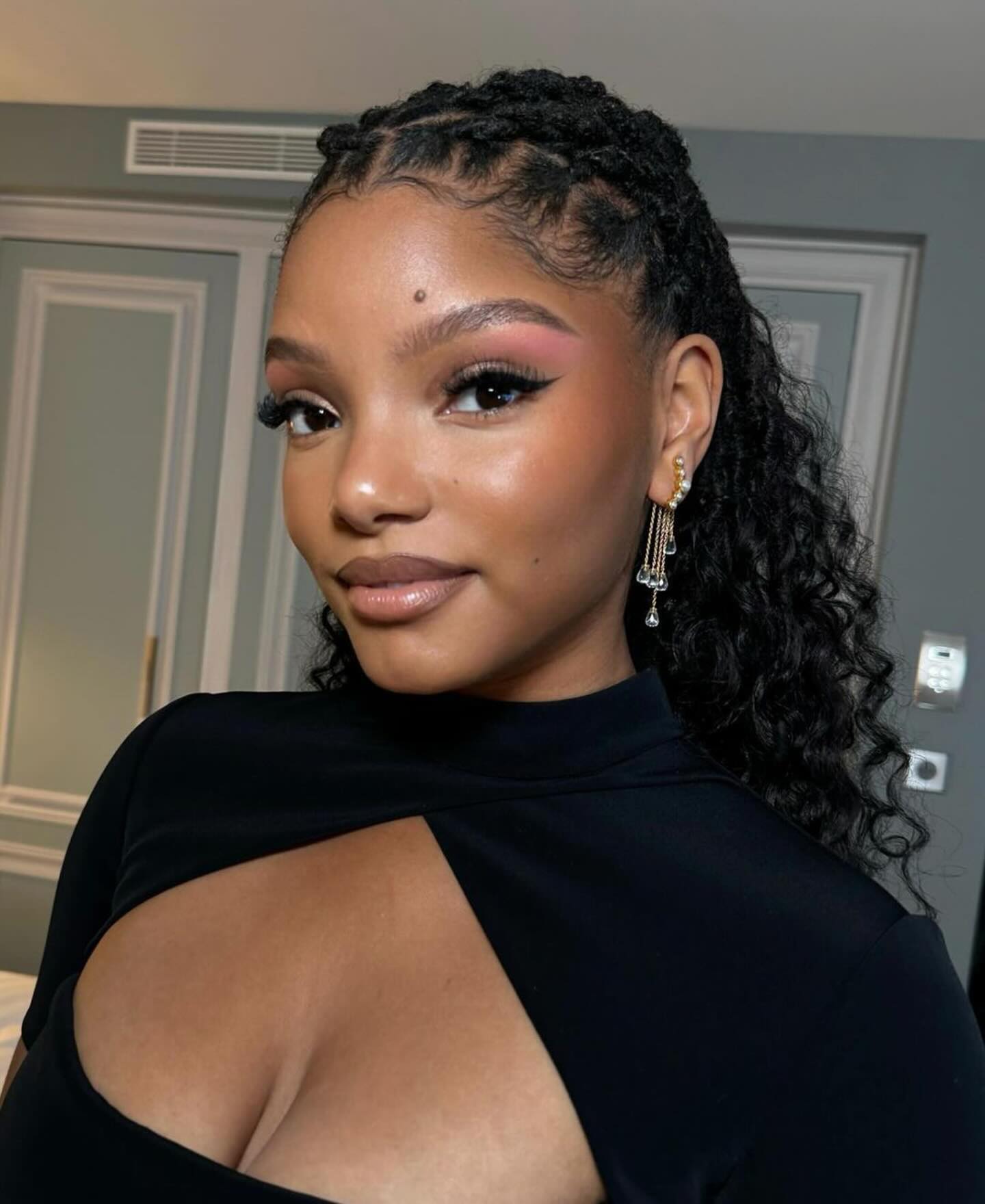 Classic Chignon With Soft Tendrils — Winter Party Hairstyles
