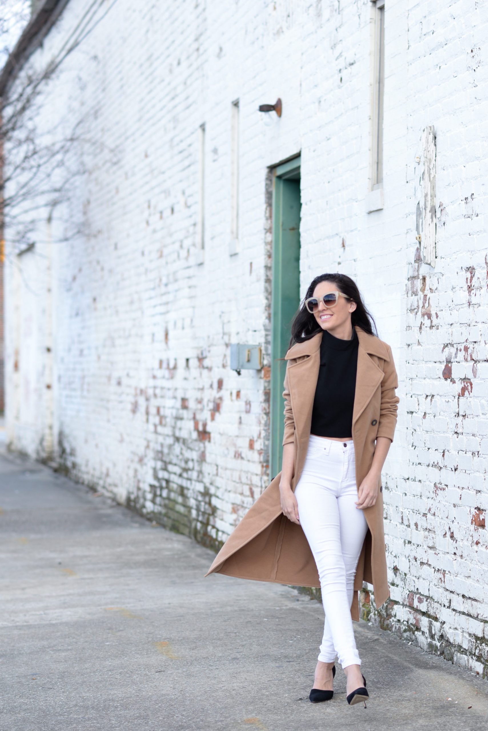 Camel Coat with Black Turtleneck and White Skinny Jeans — Neutral Winter Outfits