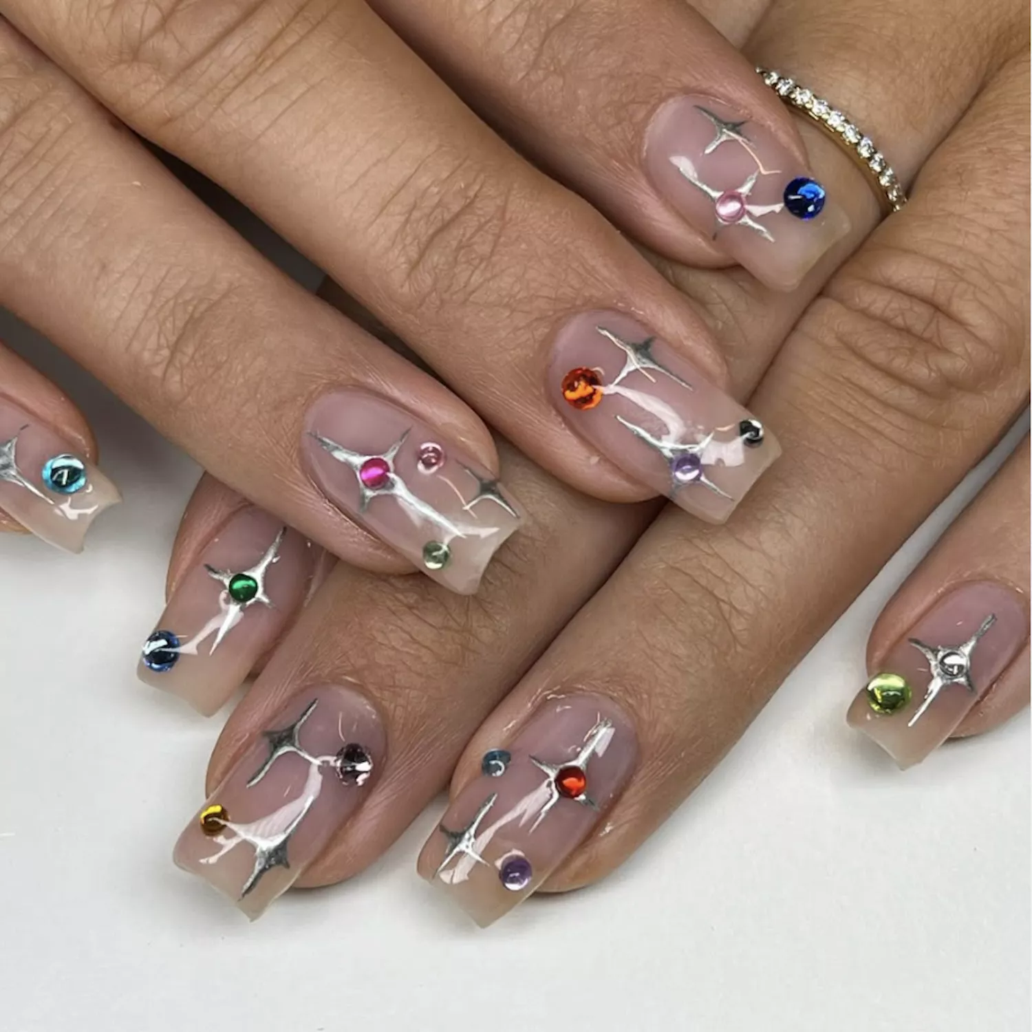 Sheer Nude Silver Star Rhinestone Nails Sheer Nude Silver Star Rhinestone Nails — Winter Square Nails