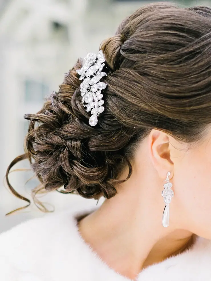 Dark Brown Twisted Updo With Ornate Accessory Dark Brown Twisted Updo With Ornate Accessory — Winter Wedding Hairstyles