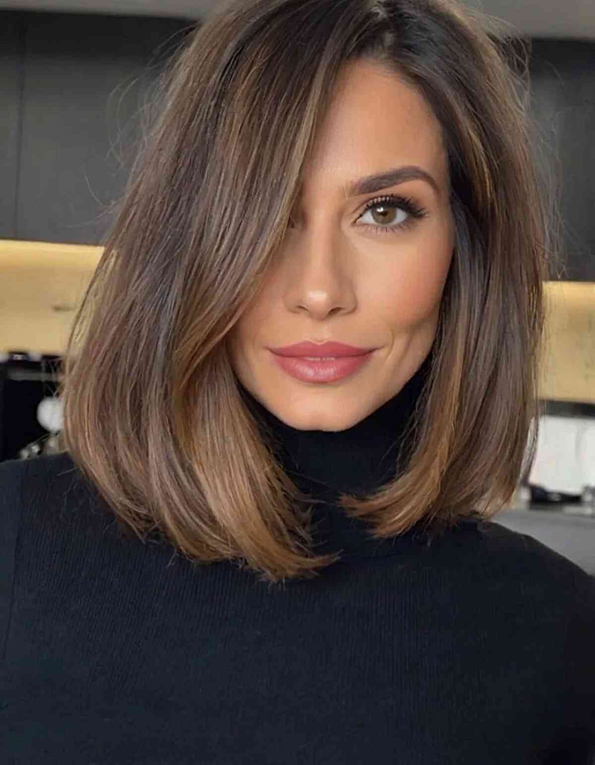 Dark Brown With Subtle Highlights Collarbone Bob With Subtle Waves — Winter Haircuts for Women Over 40