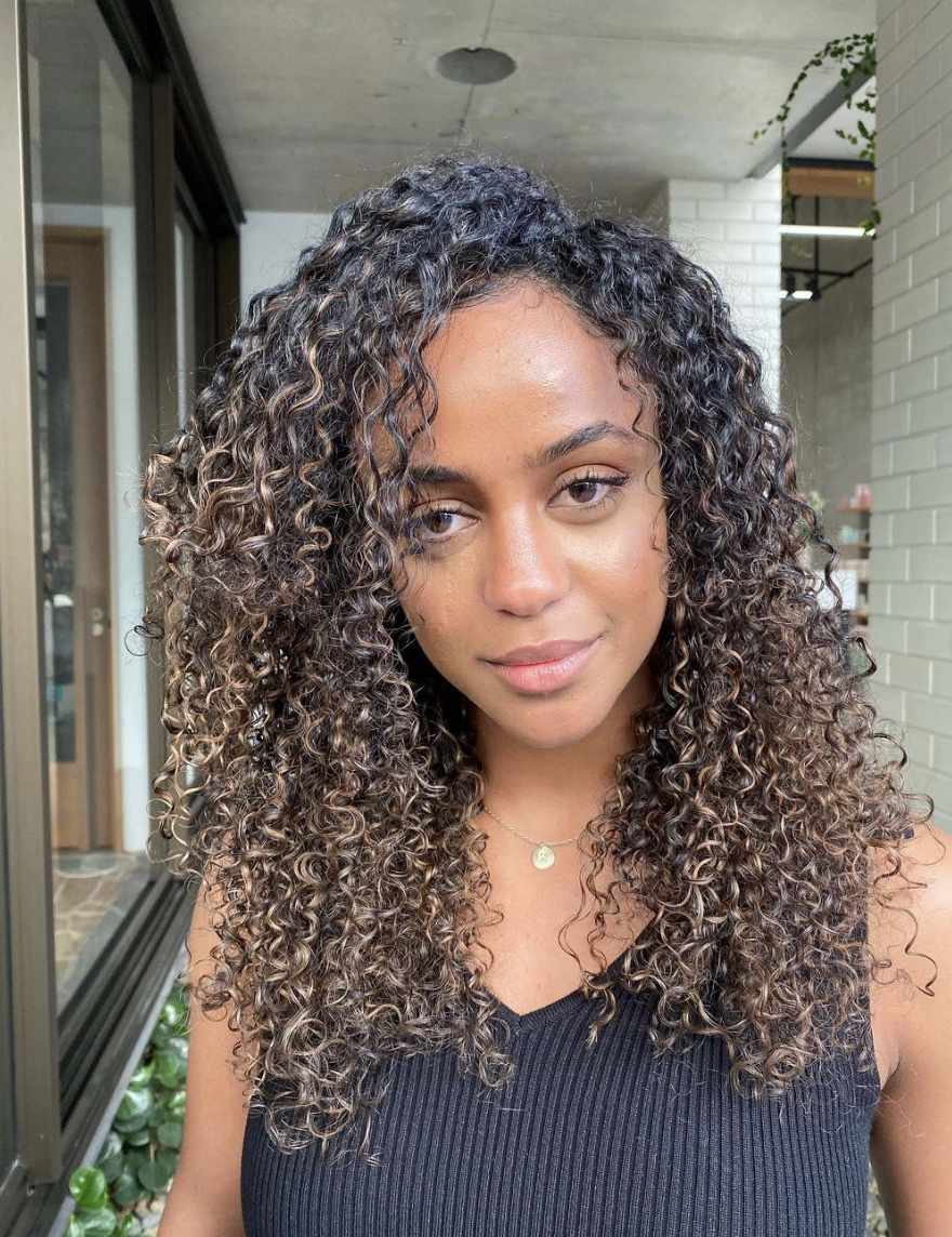 Layers Mid-Back Wavy Ash Blonde With Subtle Highlights Layers Mid-Back Wavy Ash Blonde With Subtle Highlights — Winter Hair Colors for Curly Hair