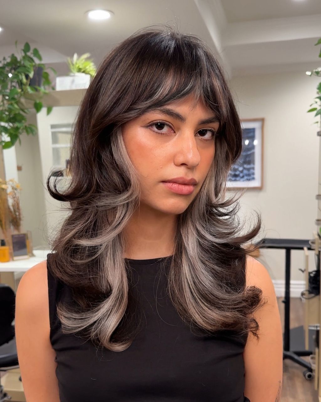 Collarbone Shag With Bold Grey Streaks Collarbone Shag With Bold Grey Streaks — Winter Haircuts for Wavy Hair