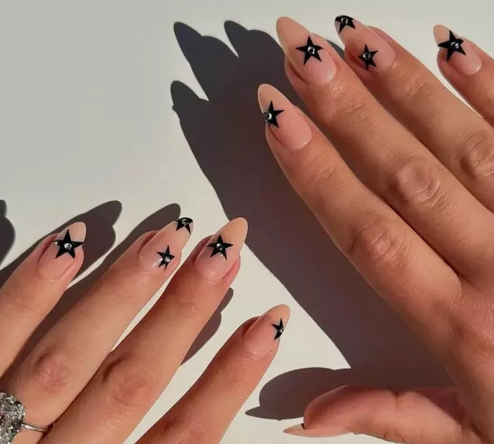 Long Almond Black Stars on Nude Long Almond Black Stars on Nude — Black Nail Ideas