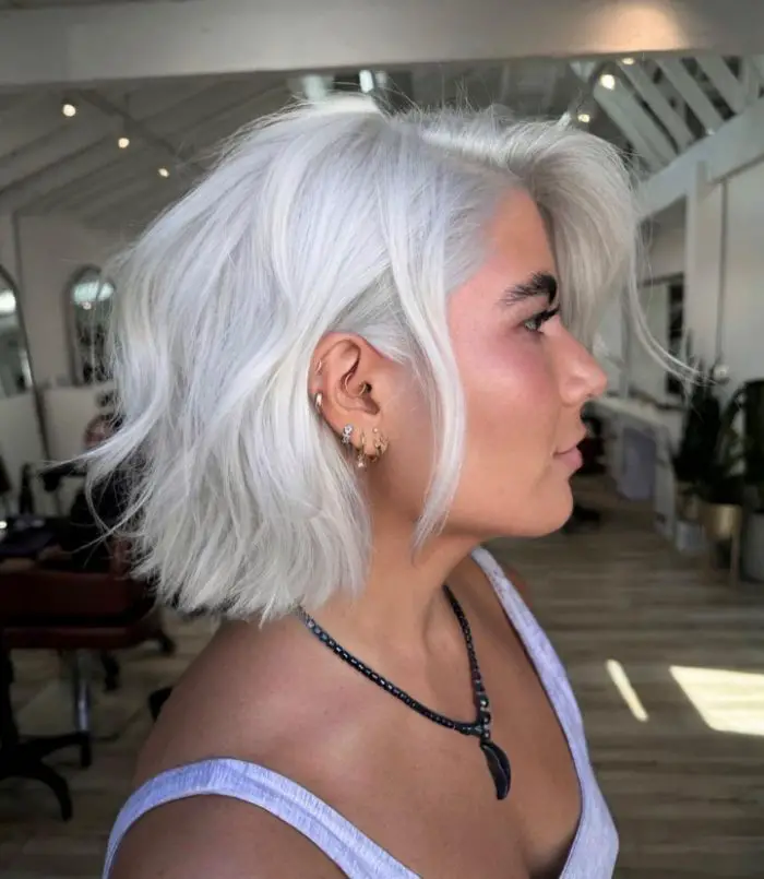Chin Ash Blonde Wavy Bob Chin Ash Blonde Wavy Bob — Winter Hair Colors for Short Hair