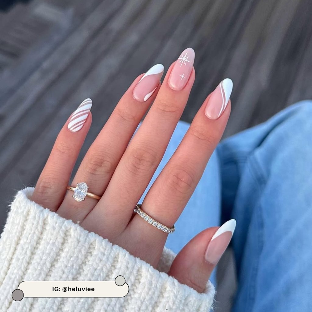 Winter Swirls and Snowflake Medium Almond Nails Winter Swirls and Snowflake Medium Almond Nails — Winter White Nails