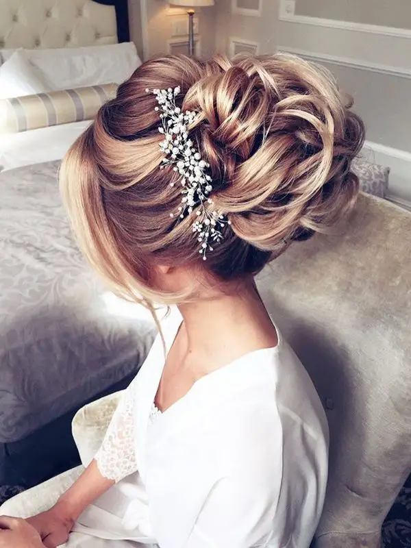 Voluminous Blonde Updo With Beaded Piece Voluminous Blonde Updo With Beaded Piece — Winter Wedding Hairstyles