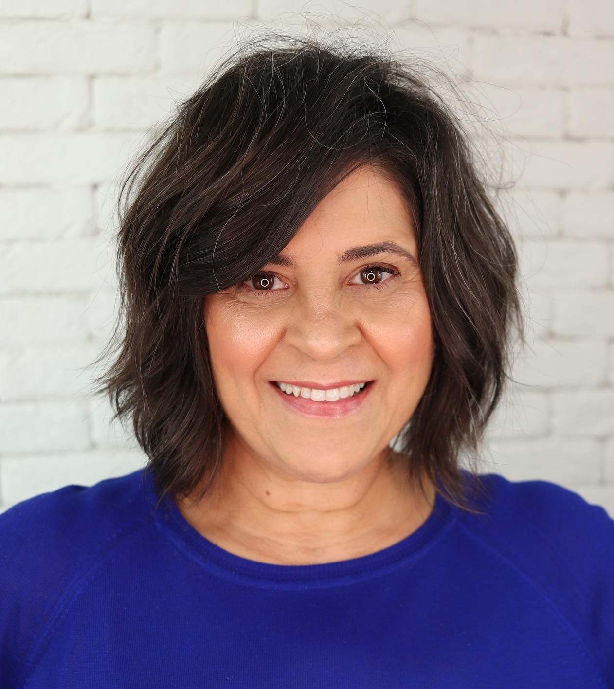 Textured Dark Brown Bob With Grey Highlights Textured Dark Brown Bob With Grey Highlights — Winter Hairstyles for Plus Size Women