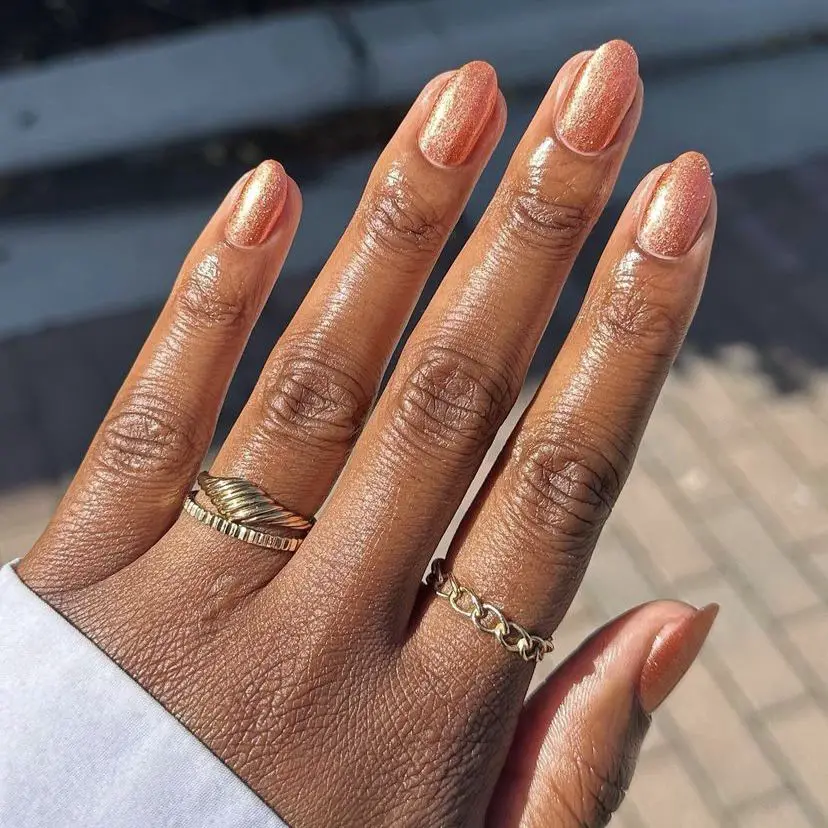 Shimmery Rose Gold Medium Almond Nails Shimmery Rose Gold Medium Almond Nails — Winter Nail Colors for Women Over 40