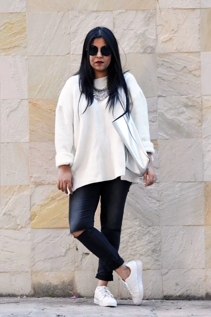 Chic Casual: White Sweater with Ripped Black Jeans Chic Casual: White Sweater with Ripped Black Jeans — Oversized Sweater Outfits