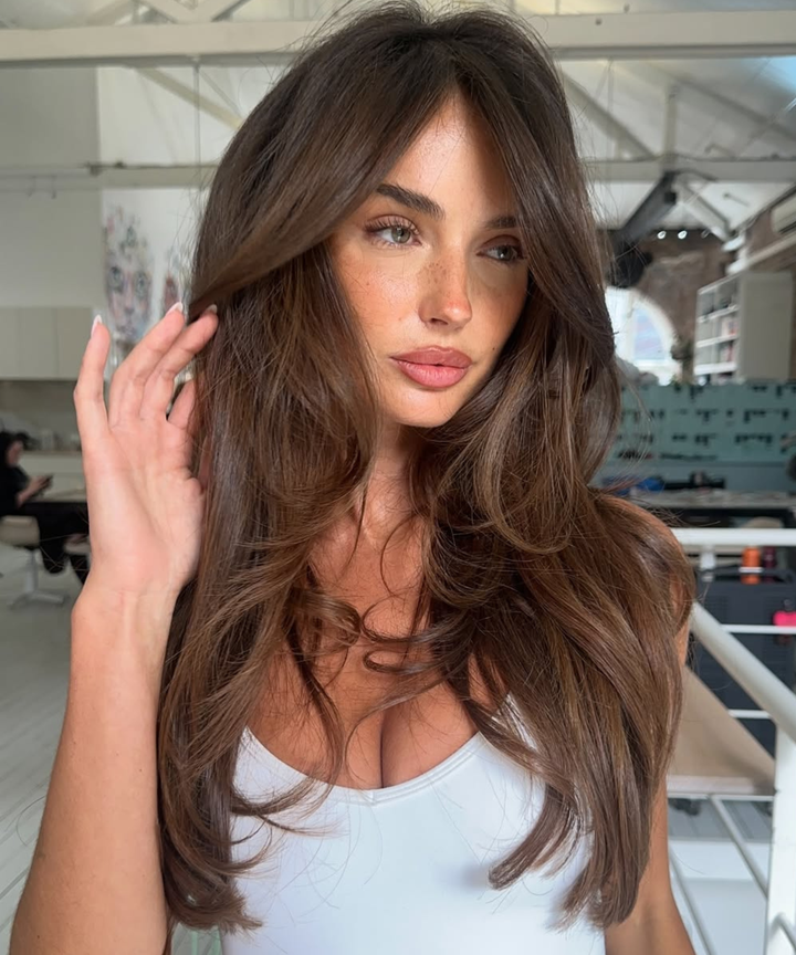 Voluminous Lob With Curtain Bangs Voluminous Lob With Curtain Bangs — Medium Length Winter Haircuts