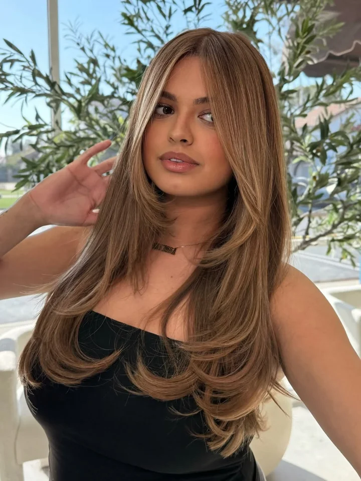 Medium Brown With Subtle Highlights Collarbone Layers With Voluminous Curtain Bangs Medium Brown With Subtle Highlights Collarbone Layers With Voluminous Curtain Bangs — Winter Haircuts for Women