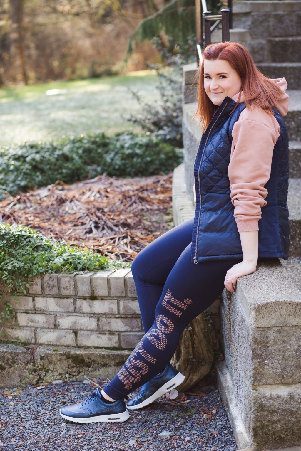 Pink Hoodie and Navy Vest with Rose Gold Leggings — Winter Workout Outfits