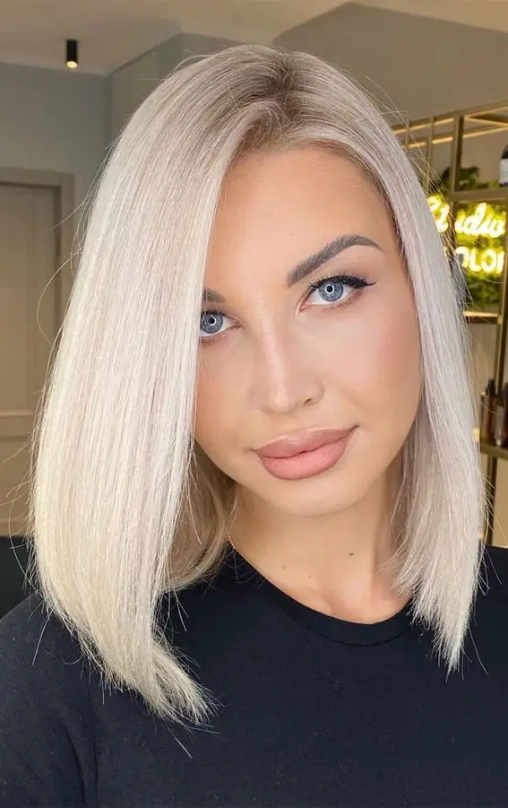 Ash Blonde Lob With Curtain Bangs Ash Blonde Lob With Curtain Bangs — Winter Hair Colors for Blue Eyes
