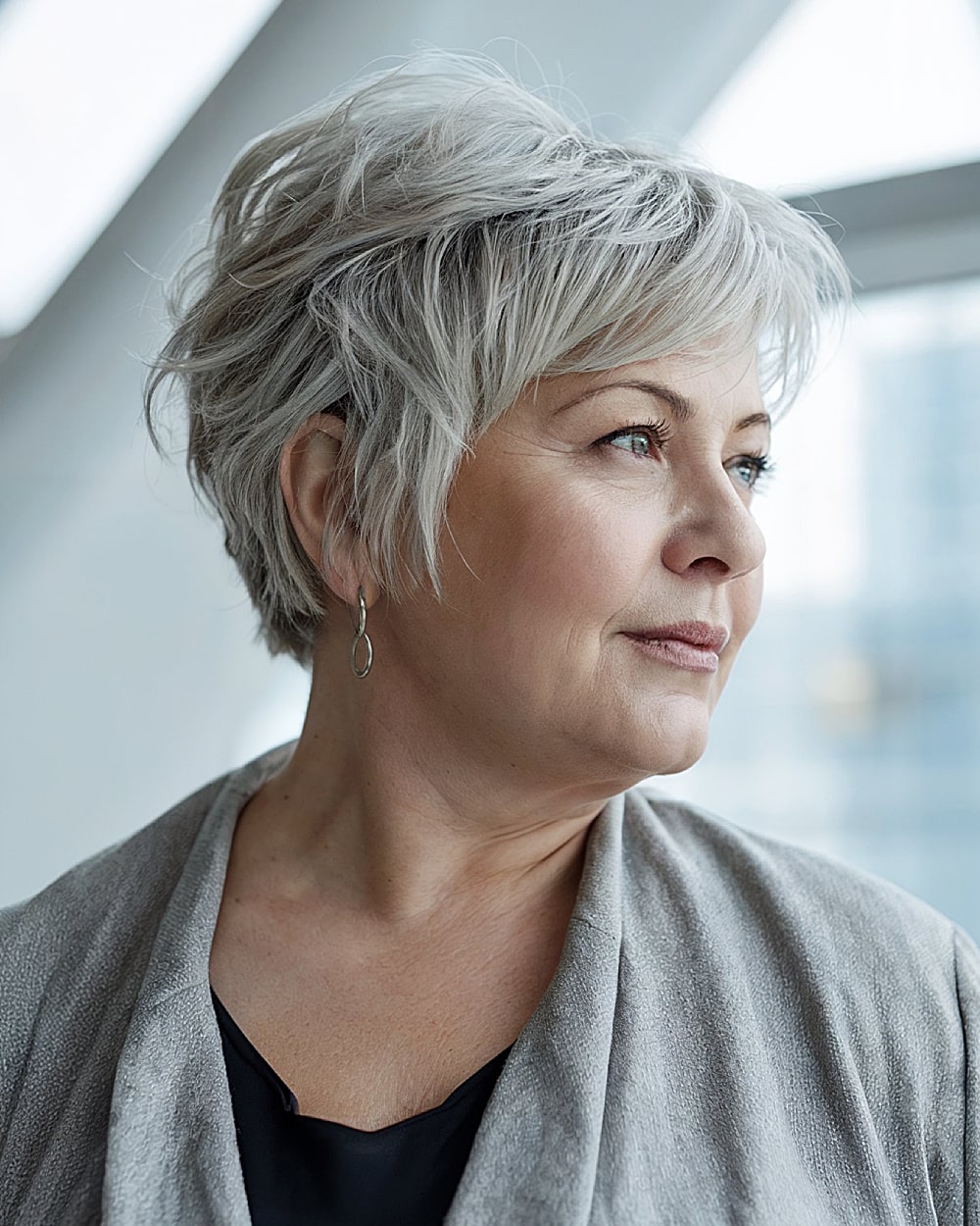 Textured Silver Grey Bob With Side Bangs Textured Silver Grey Bob With Side Bangs — Winter Haircuts for Plus Size Women