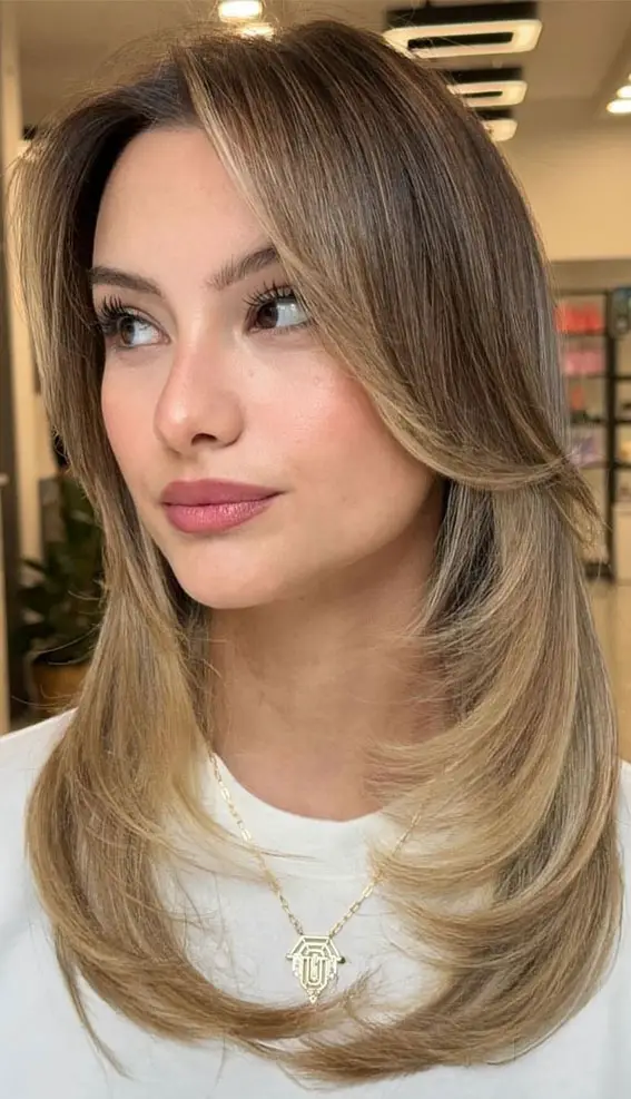 Mid-Back Golden Blonde Layers Mid-Back Golden Blonde Layers — Winter Haircuts with Curtain Bangs