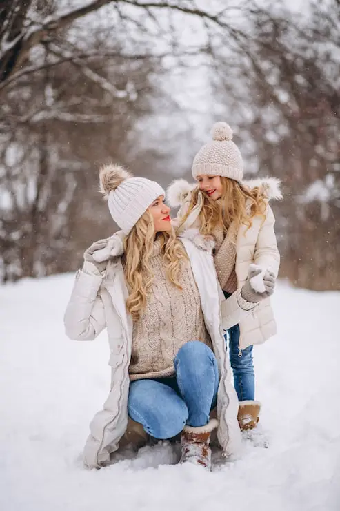 Matching Cream Puffer Coats and Pom-Pom Hats for Winter Photos — Winter Family Photo Outfits