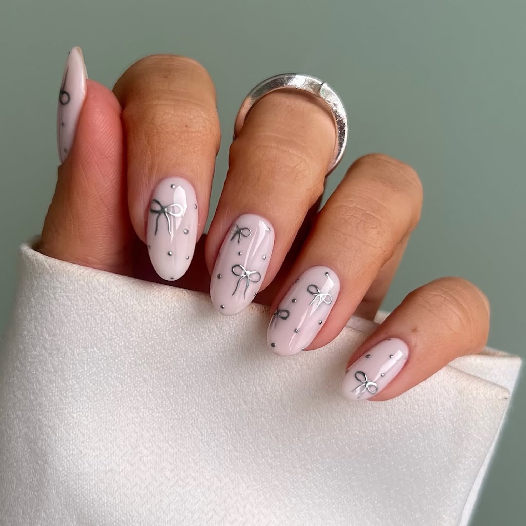 Small Silver Bows And Dots Visual Idea — Minimalist Winter Nails
