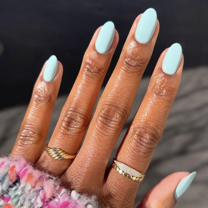 Solid Glossy Light Blue Medium Oval Nails Solid Glossy Light Blue Medium Oval Nails — Winter Nail Colors for Women Over 40