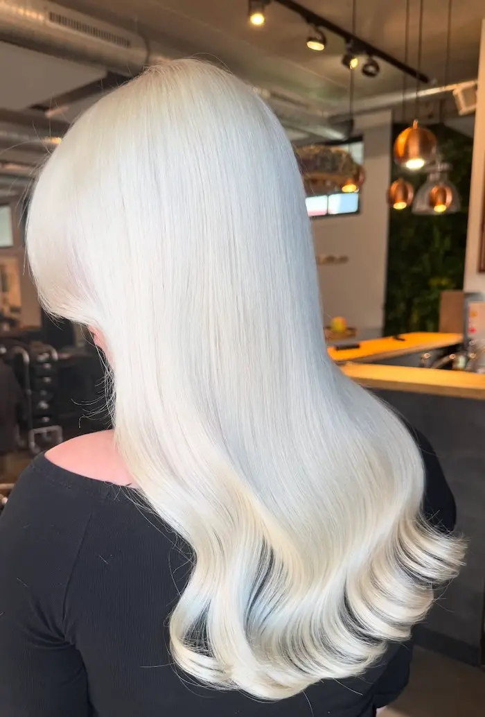 Back View Full Hair Mid-Back Icy Platinum Blonde With Waves Back View Full Hair Mid-Back Icy Platinum Blonde With Waves — Winter Hair Colors for Blondes