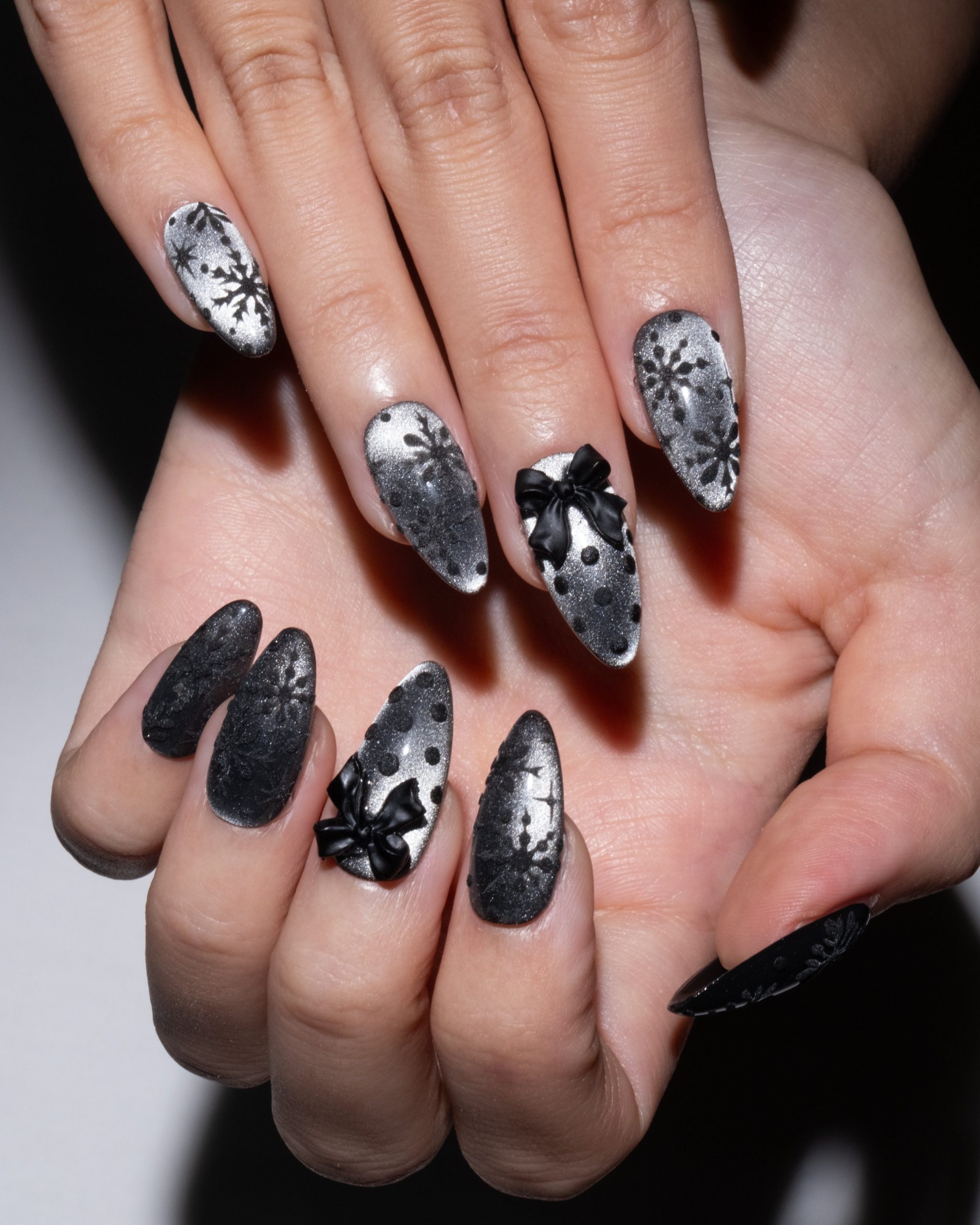 Matte Black With Silver Snowflakes And 3D Bows Matte Black With Silver Snowflakes And 3D Bows — Winter Black Nails