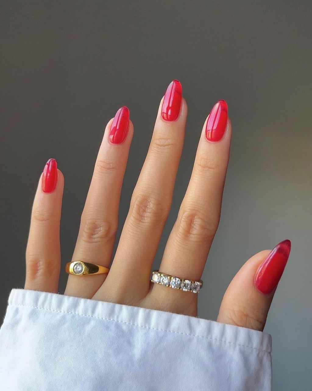 Bright Red with Dark Red Marbling Medium Almond Nails Bright Red with Dark Red Marbling Medium Almond Nails — Winter Nail Colors for Pale Skin