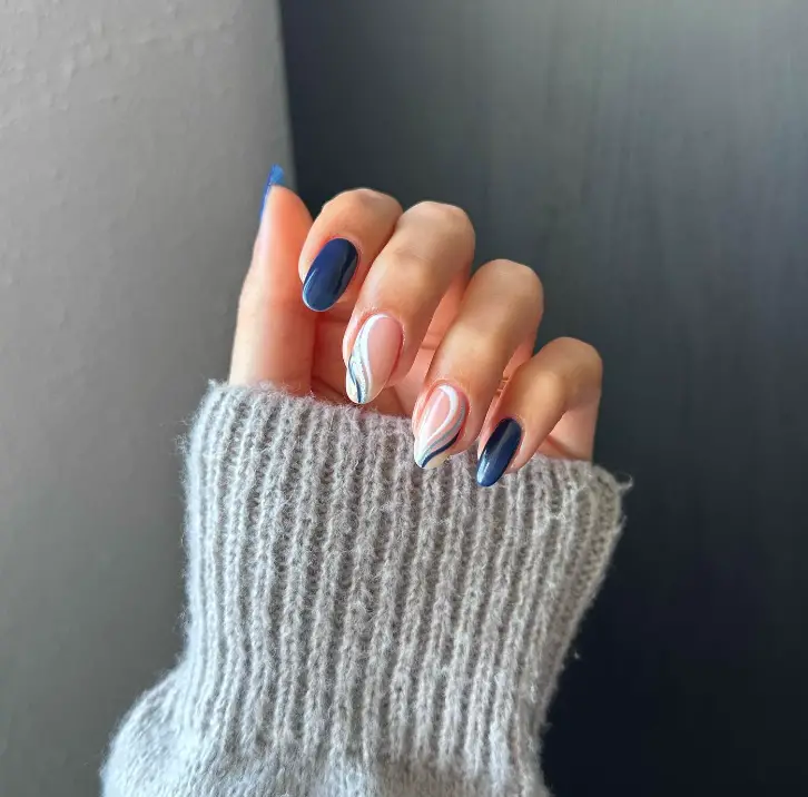 Medium Stiletto Abstract Swirls Medium Stiletto Abstract Swirls — Winter Blue Nails