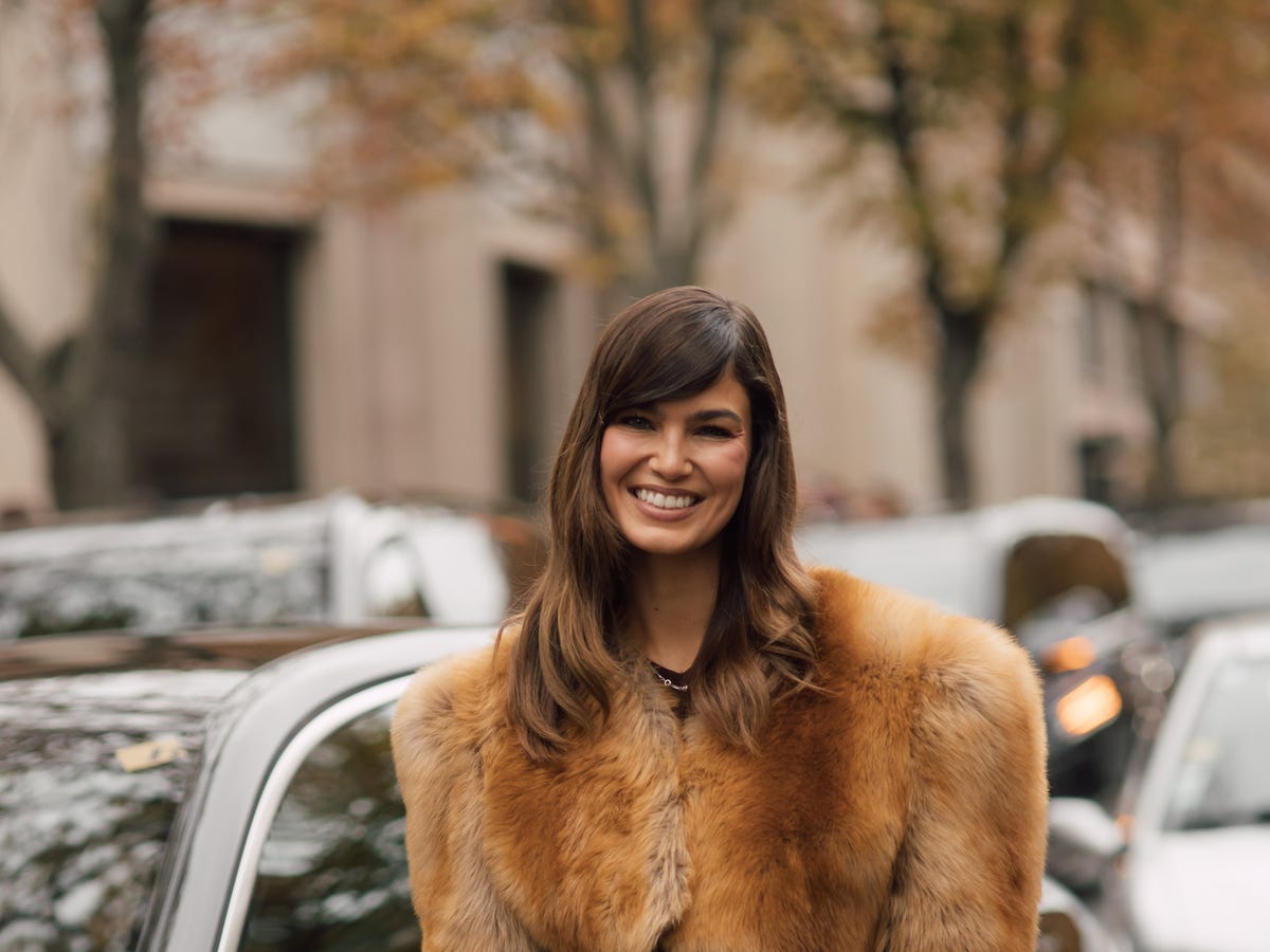 Wavy Dark Brown With Side-Swept Bangs — Winter Hairstyles with Bangs