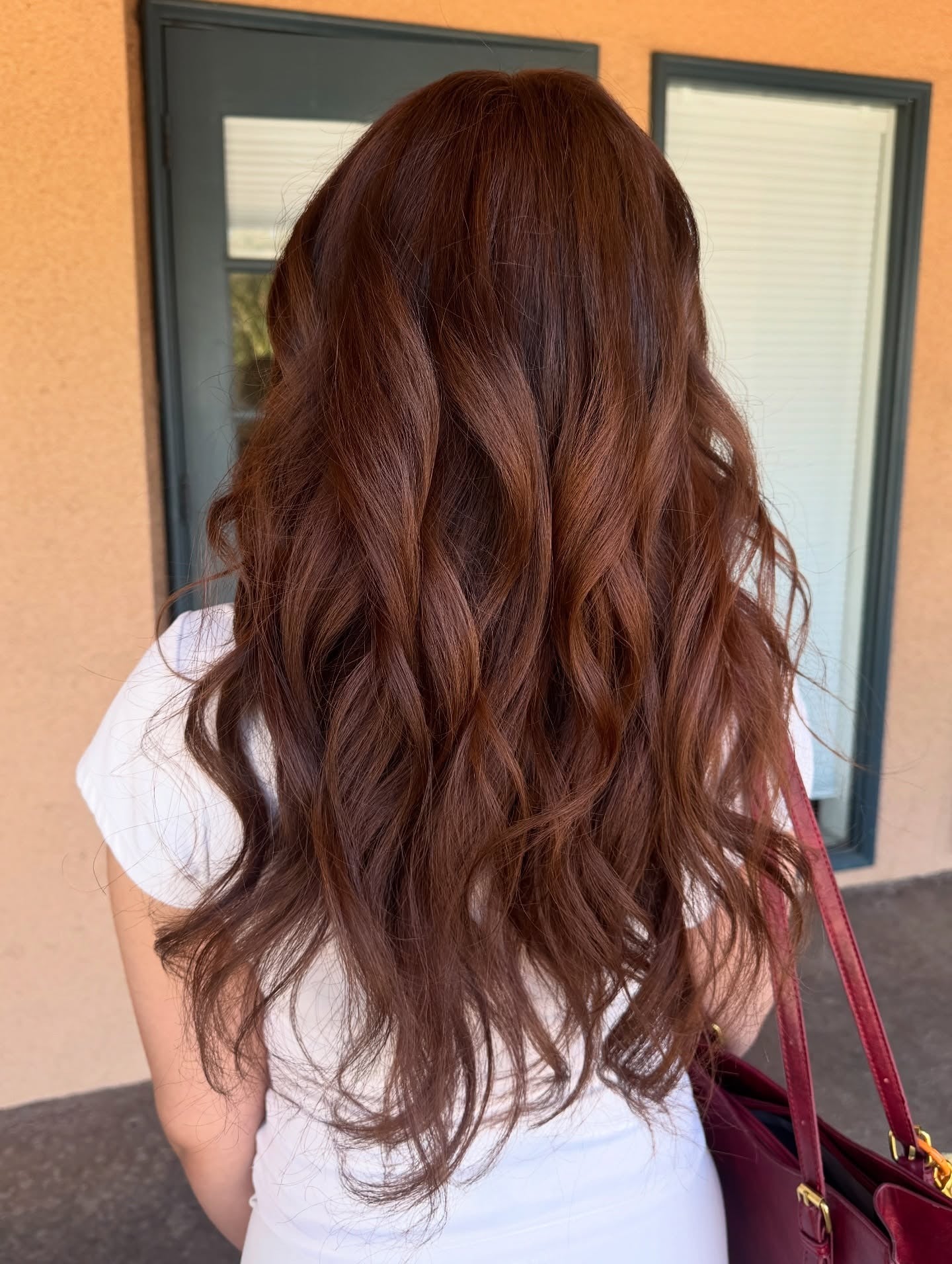 Mid-Back Waves With Warm Highlights — Cinnamon Brown Hair