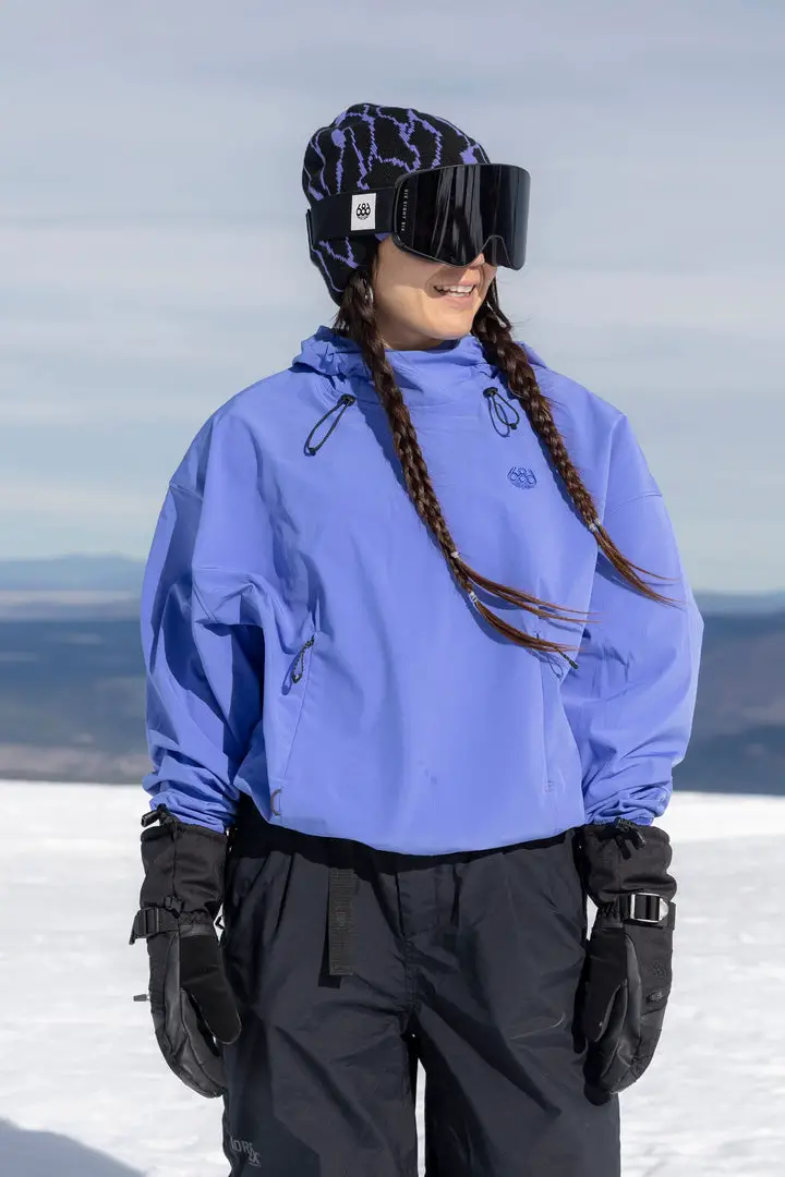 Vibrant Purple Anorak Paired with Black Ski Pants Vibrant Purple Anorak Paired with Black Ski Pants — Ski Outfits