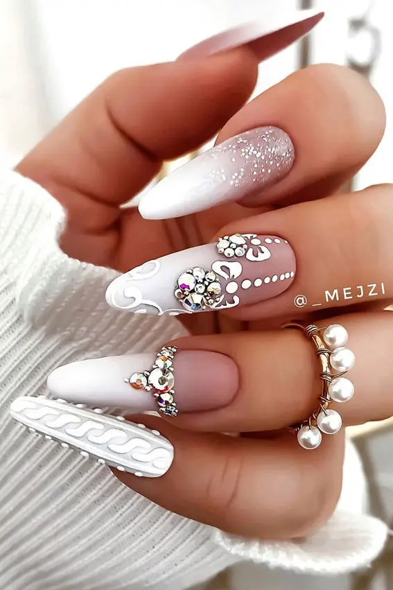 3D Knit Nude Rhinestone Stilettos 3D Knit Nude Rhinestone Stilettos — Winter Stiletto Nails